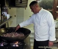 Giant wok of onions